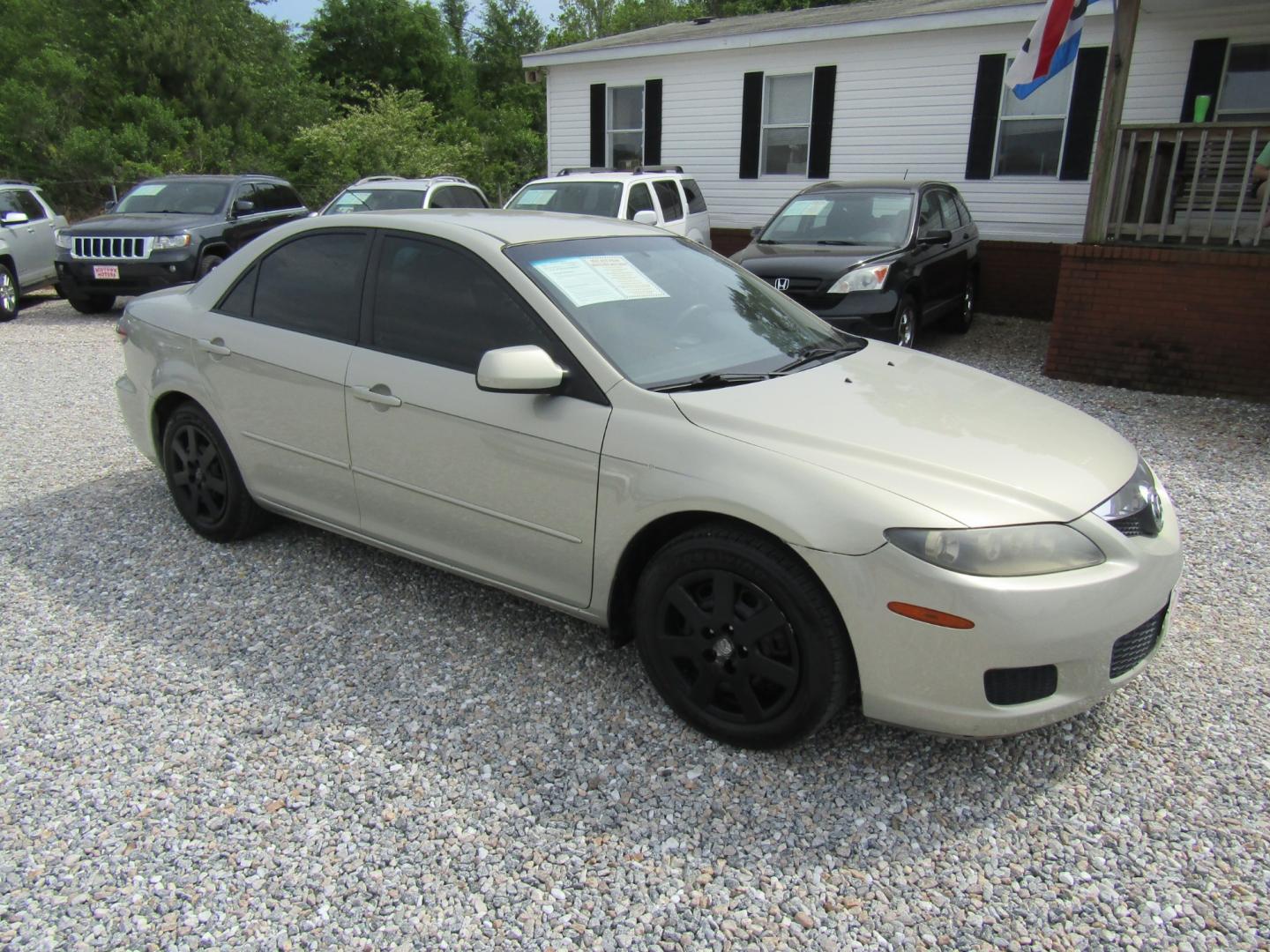 2006 Gold /Tan Mazda MAZDA6 i Sports Sedan (1YVFP80C465) with an 2.3L L4 DOHC 16V engine, Automatic transmission, located at 15016 S Hwy 231, Midland City, AL, 36350, (334) 983-3001, 31.306210, -85.495277 - Photo#0